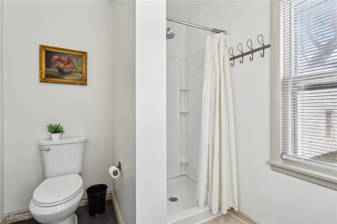 17901 Windward Road Cleveland, OH 44119 - Photo 11 of 33 Bathroom featuring toilet and walk in shower