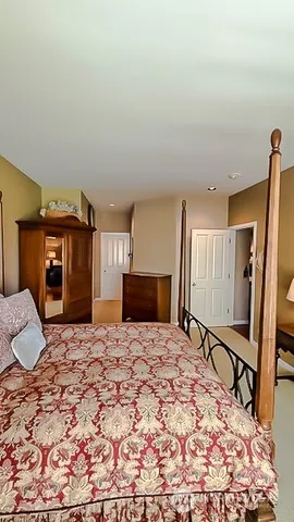a bathroom with a sink vanity tub and a mirror