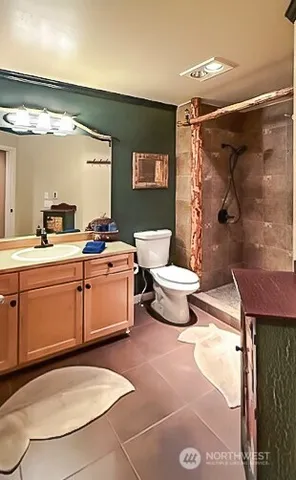 a view of a dining room with furniture and a window