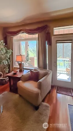 a view of a chairs and table in the patio