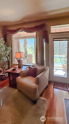 a view of a chairs and table in the patio