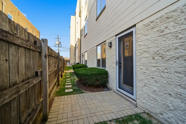a view of a pathway both side of building