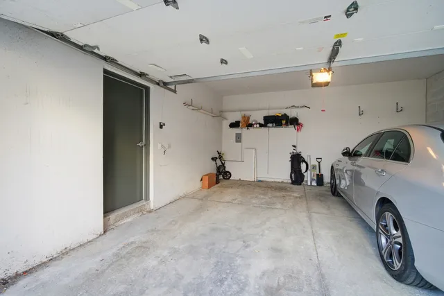 a view of a garage with cars