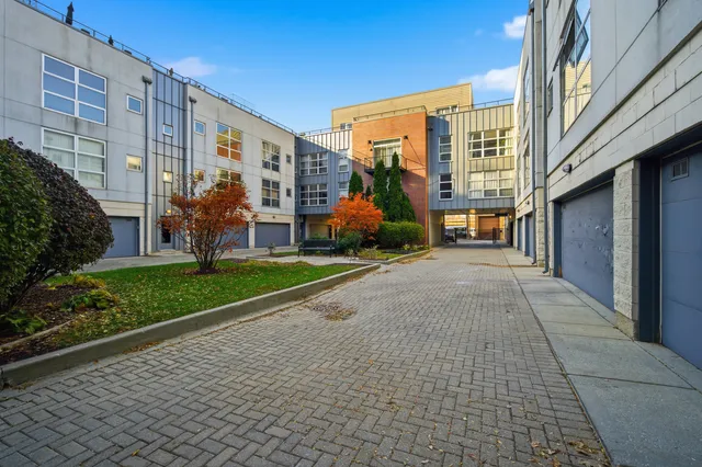 a view of a building with a yard