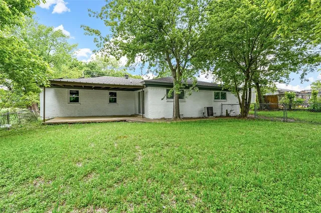 a house view with a garden space