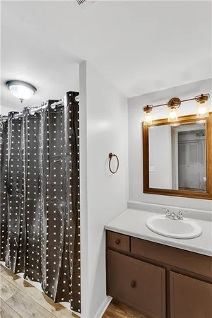 a view of a room with a projector and green walls