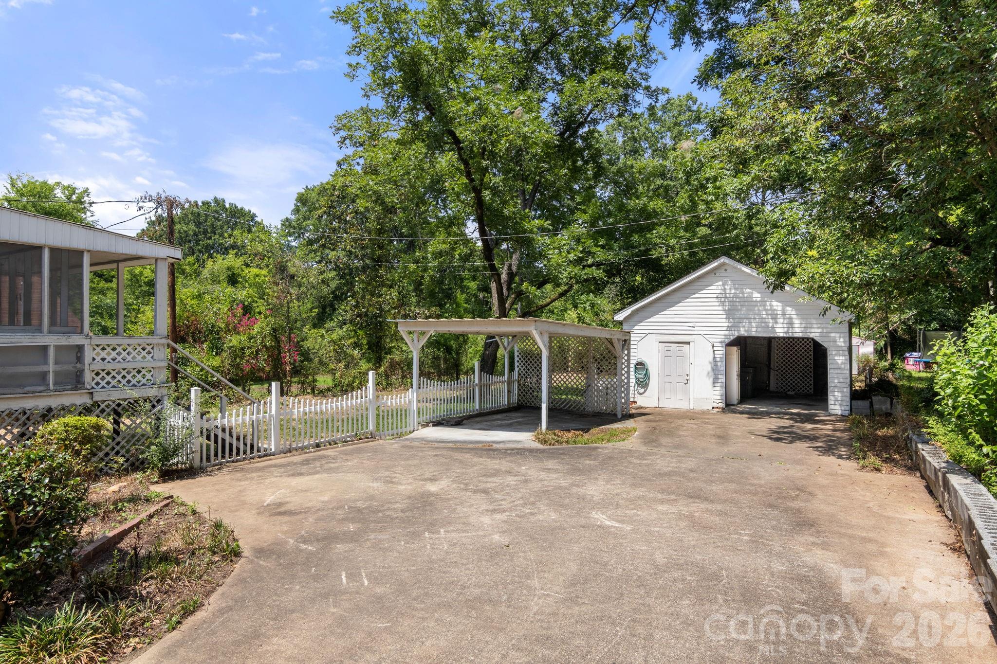 108 Reedy Street Chester, SC 29706 - Photo 33 of 42 a view of a house with a yard and potted plants