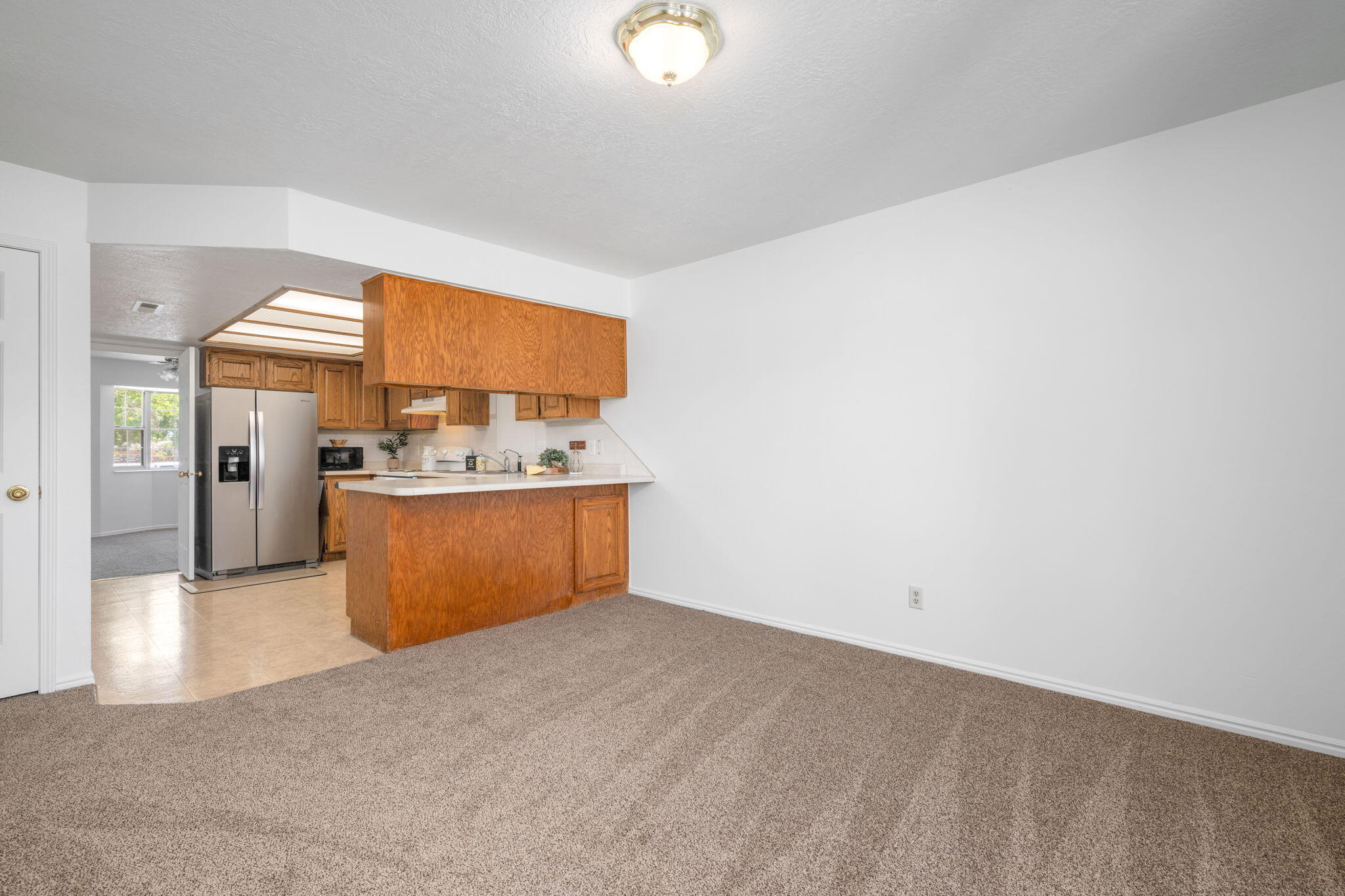 1015 South 1015 S River Road, Unit 6 St. George, UT 84790 - Photo 8 of 21 Family room/Kitchen
