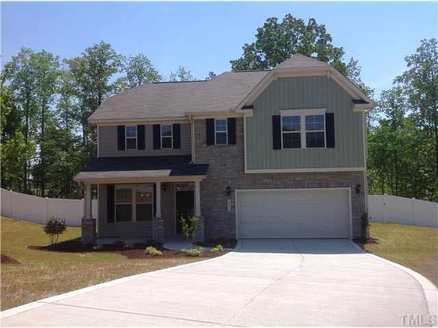 2716 Shepherd Valley Street Raleigh, NC 27610 - Photo 1 of 5 a front view of a house with a yard