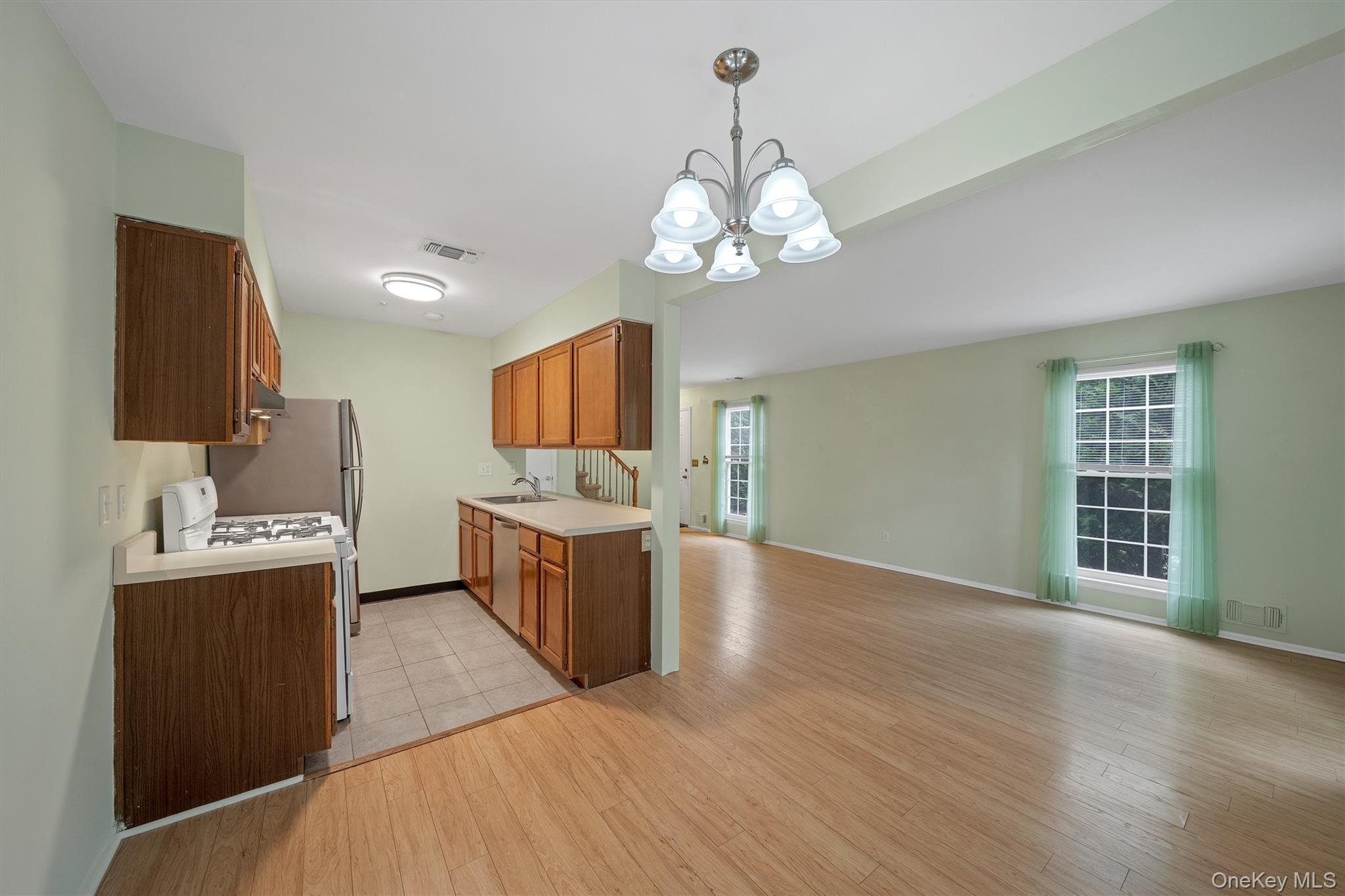 29 The Rise Warwick, NY 10990 - Photo 28 of 28 a view of kitchen with granite countertop cabinets a sink and stainless steel appliances