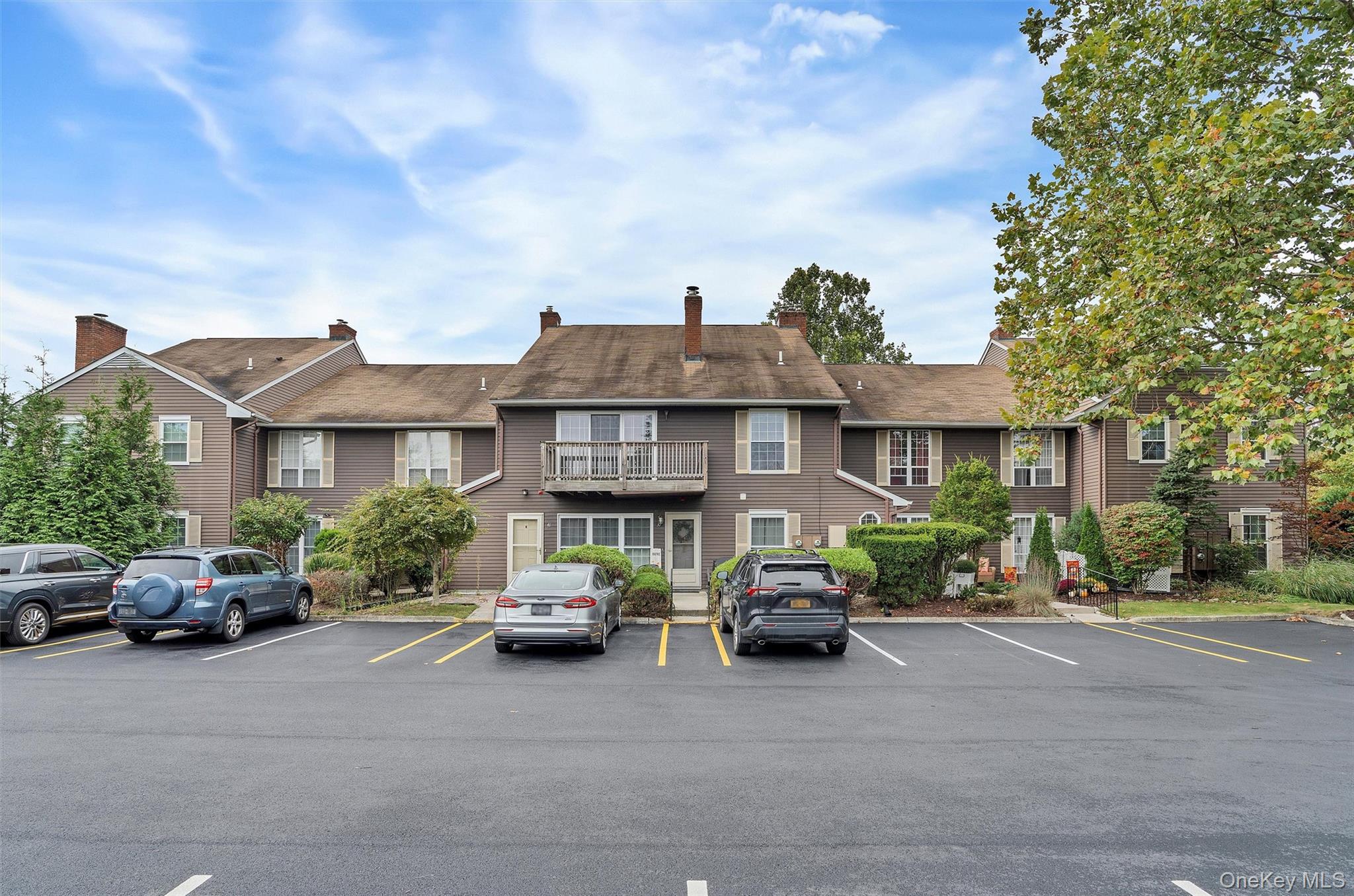 29 The Rise Warwick, NY 10990 - Photo 3 of 28 a couple of cars parked in front of a building