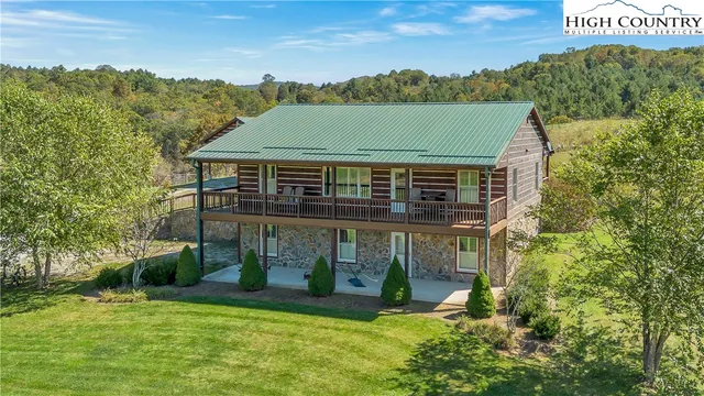 a front view of a house with yard