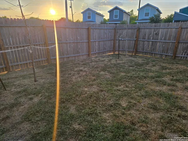 a view of a wooden fence