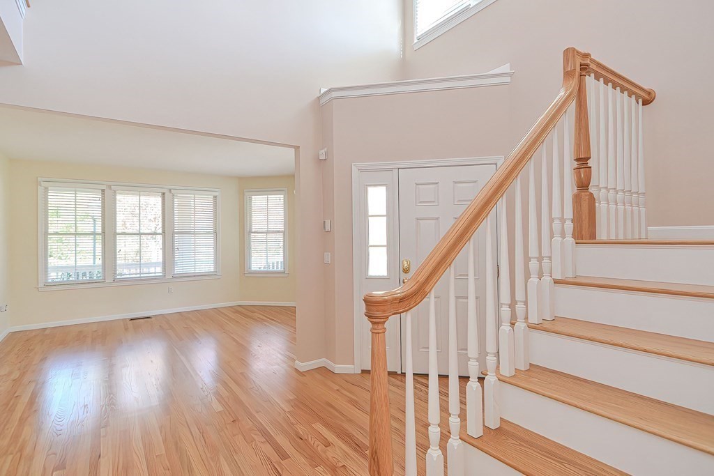 30 Codding Road, Unit 30 Norton, MA 02766 - Photo 18 of 40 a view of an entryway with wooden floor and stairs