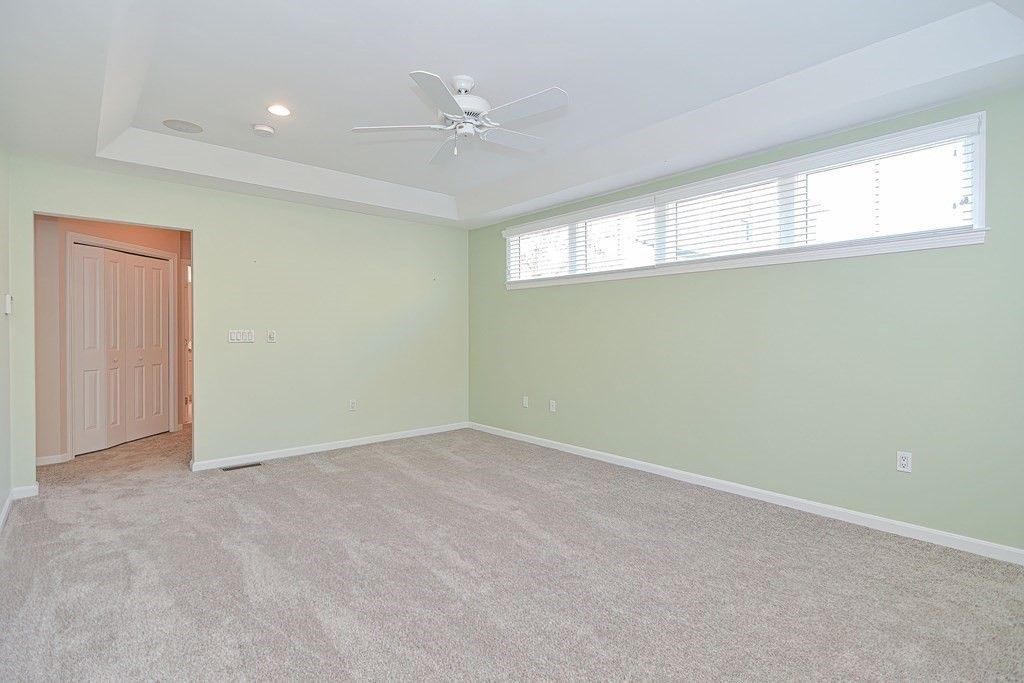 30 Codding Road, Unit 30 Norton, MA 02766 - Photo 21 of 40 an empty room with windows and closet