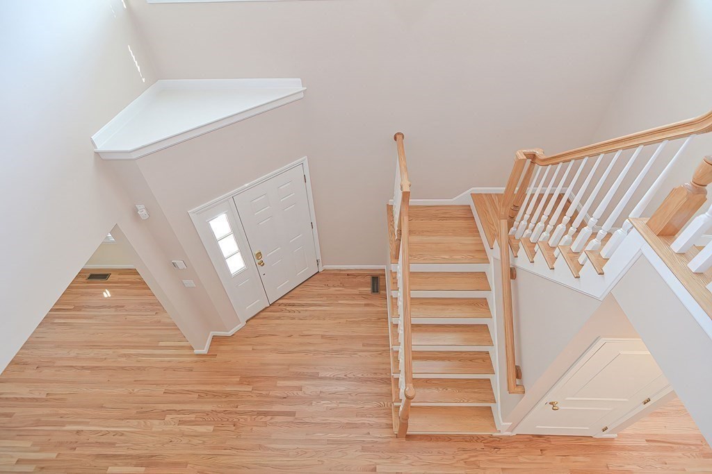 30 Codding Road, Unit 30 Norton, MA 02766 - Photo 25 of 40 a view of entryway and hall with wooden floor