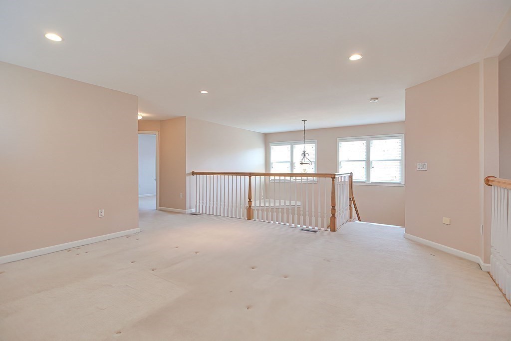 30 Codding Road, Unit 30 Norton, MA 02766 - Photo 27 of 40 a view of an empty room with a window