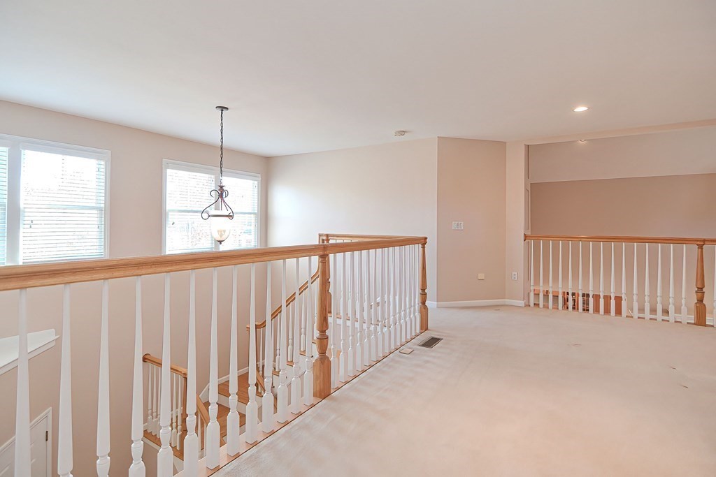 30 Codding Road, Unit 30 Norton, MA 02766 - Photo 28 of 40 a view of a hallway with stairs