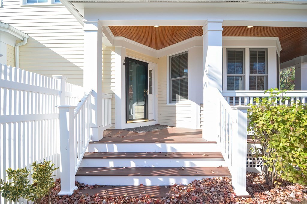 30 Codding Road, Unit 30 Norton, MA 02766 - Photo 3 of 40 a front view of a house with a porch