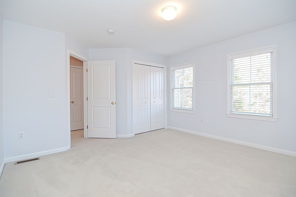 30 Codding Road, Unit 30 Norton, MA 02766 - Photo 33 of 40 an empty room with windows