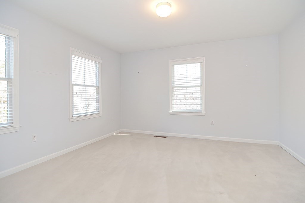 30 Codding Road, Unit 30 Norton, MA 02766 - Photo 34 of 40 an empty room with windows