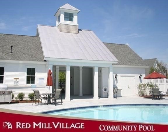 30 Codding Road, Unit 30 Norton, MA 02766 - Photo 40 of 40 a front view of a house with a yard