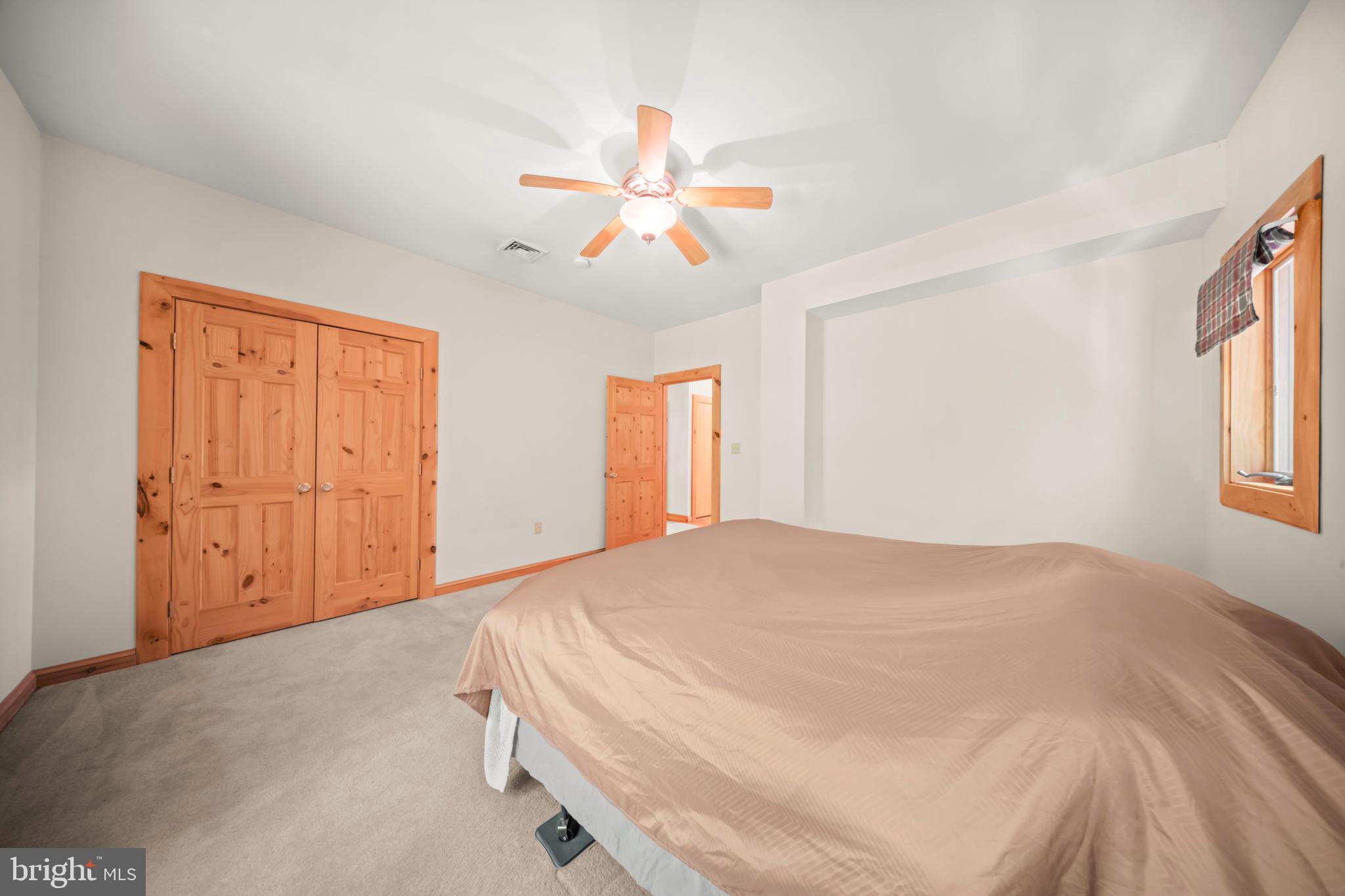 1473 North River Road Yardley, PA 19067 - Photo 33 of 42 a bedroom with a bed and a window