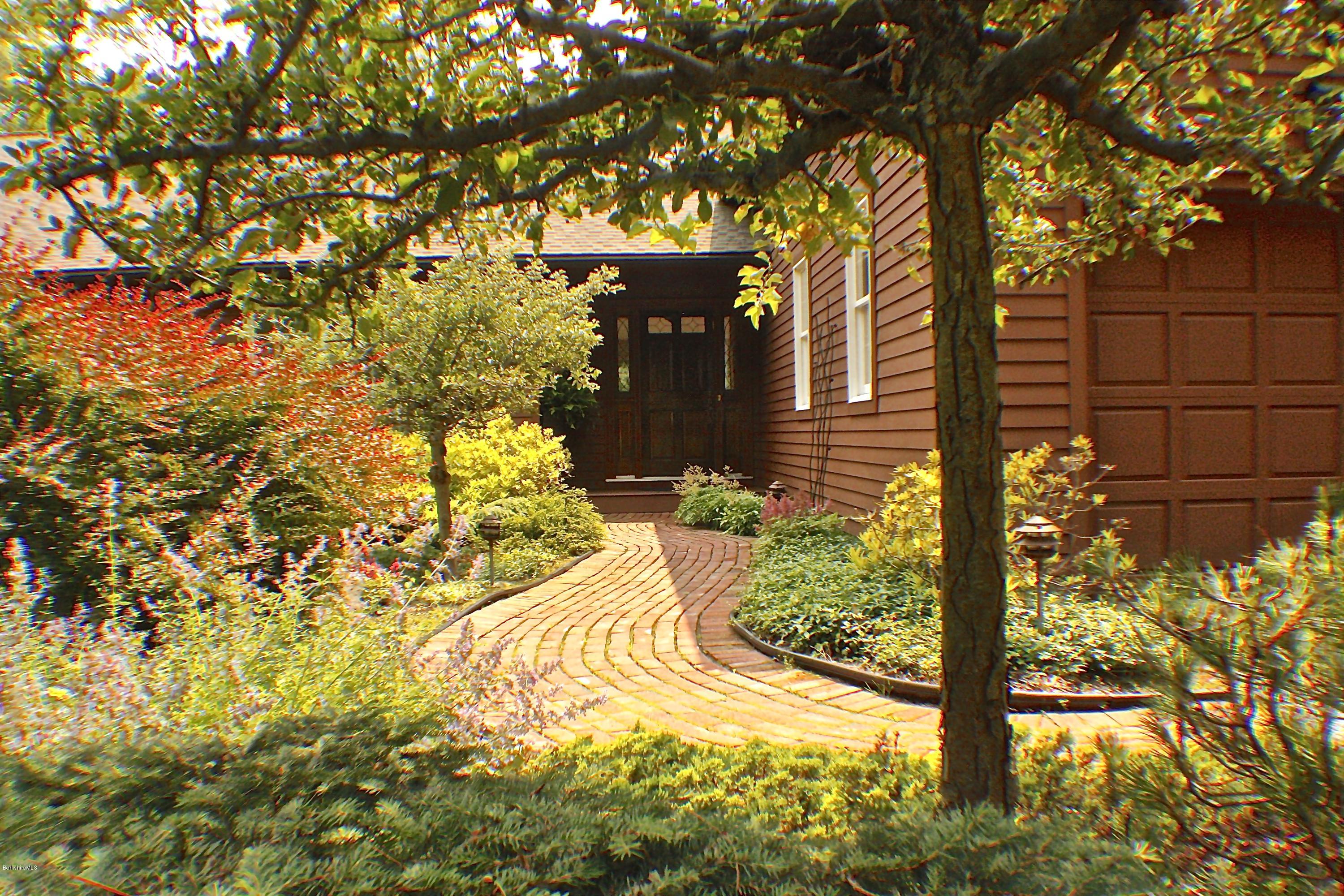 11 Quiet Knoll Road Stockbridge, MA 01266 - Photo 2 of 23 a view of a yard of the tree front of house