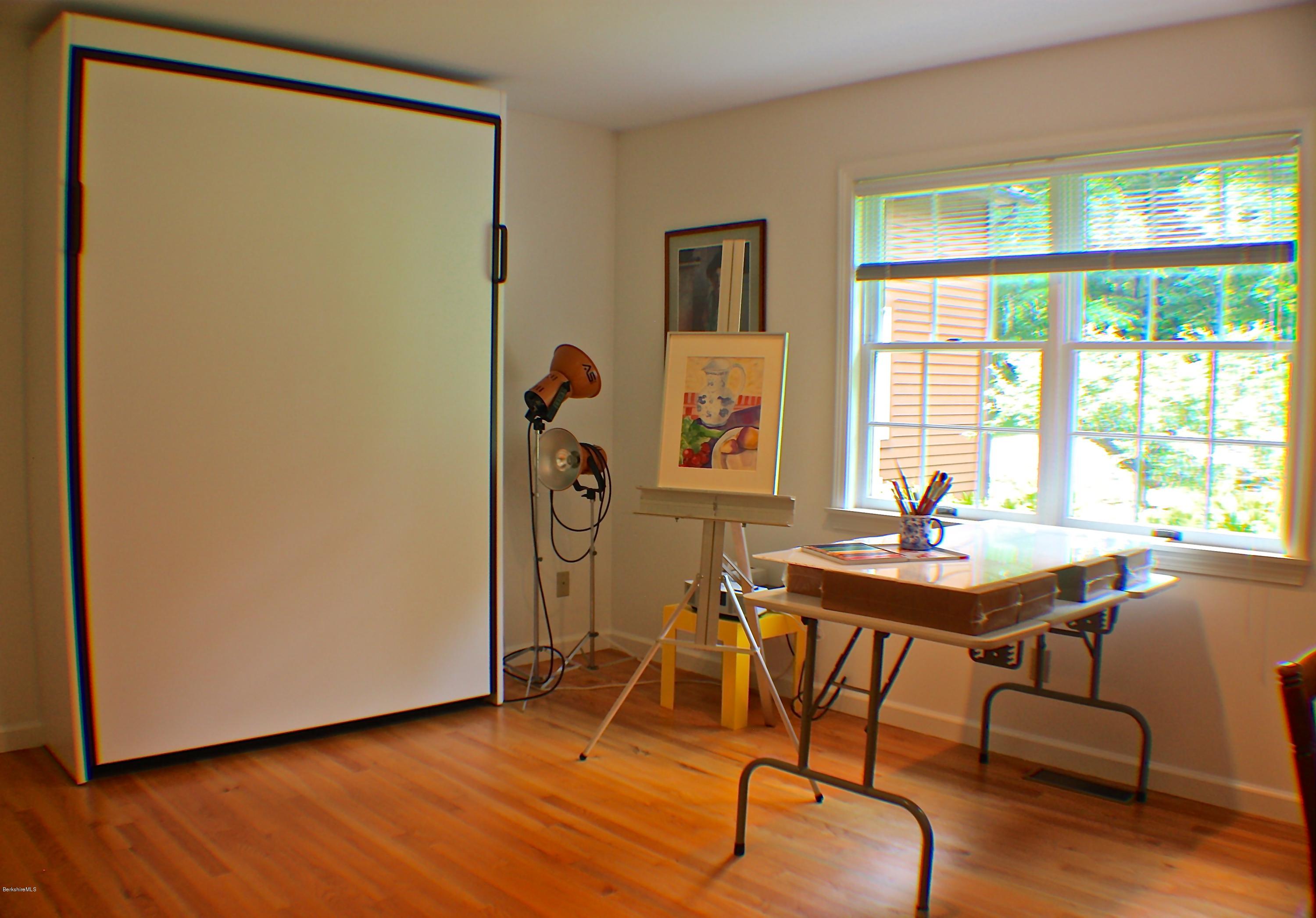 11 Quiet Knoll Road Stockbridge, MA 01266 - Photo 14 of 23 a view of a workspace with furniture and a window