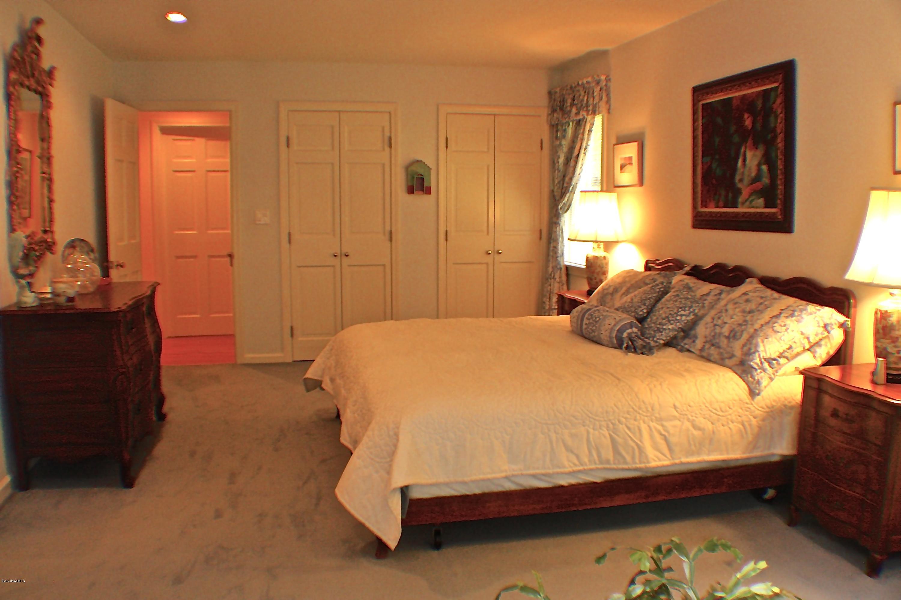 11 Quiet Knoll Road Stockbridge, MA 01266 - Photo 18 of 23 a bedroom with a bed and a window