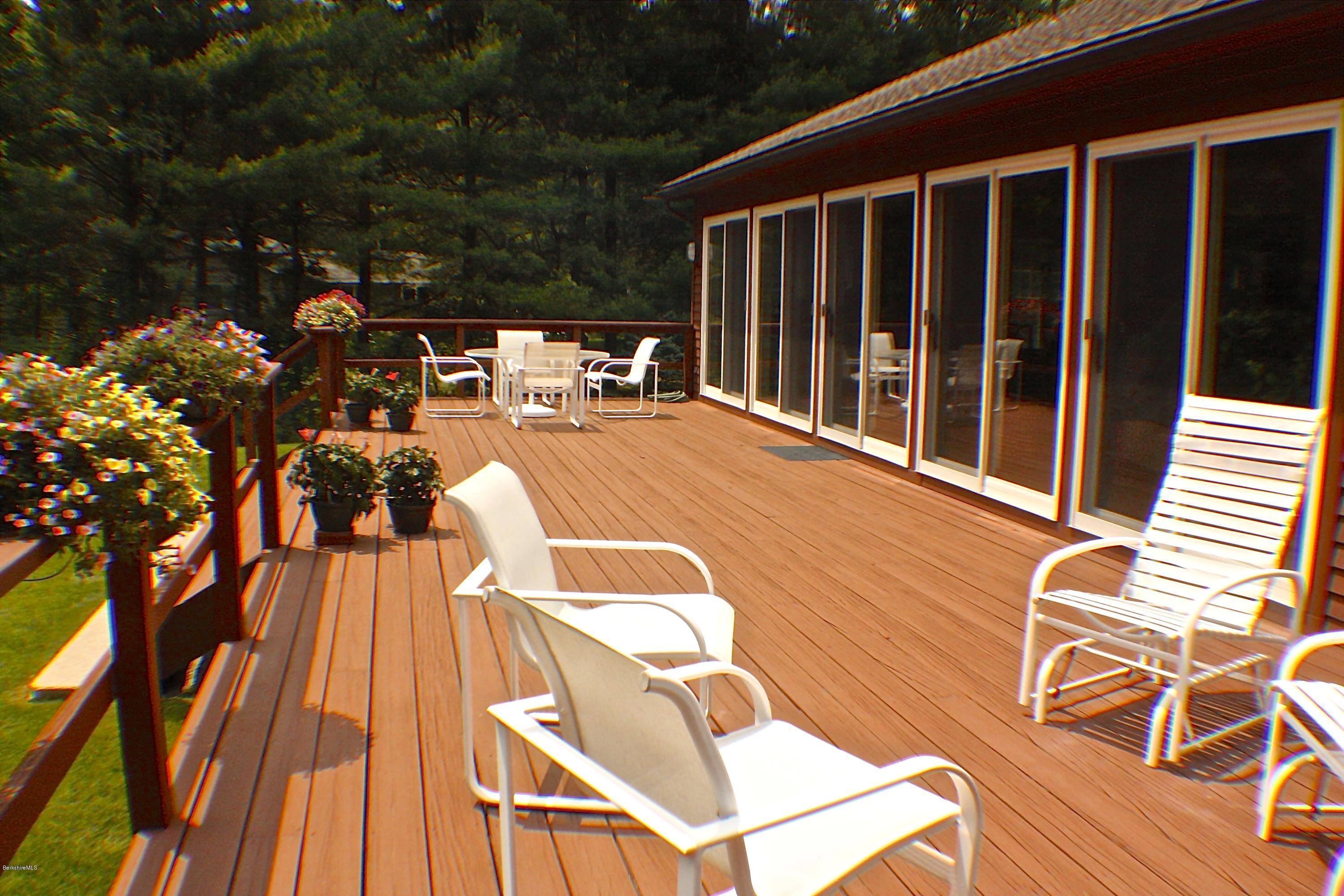 11 Quiet Knoll Road Stockbridge, MA 01266 - Photo 3 of 23 a view of a balcony with chairs