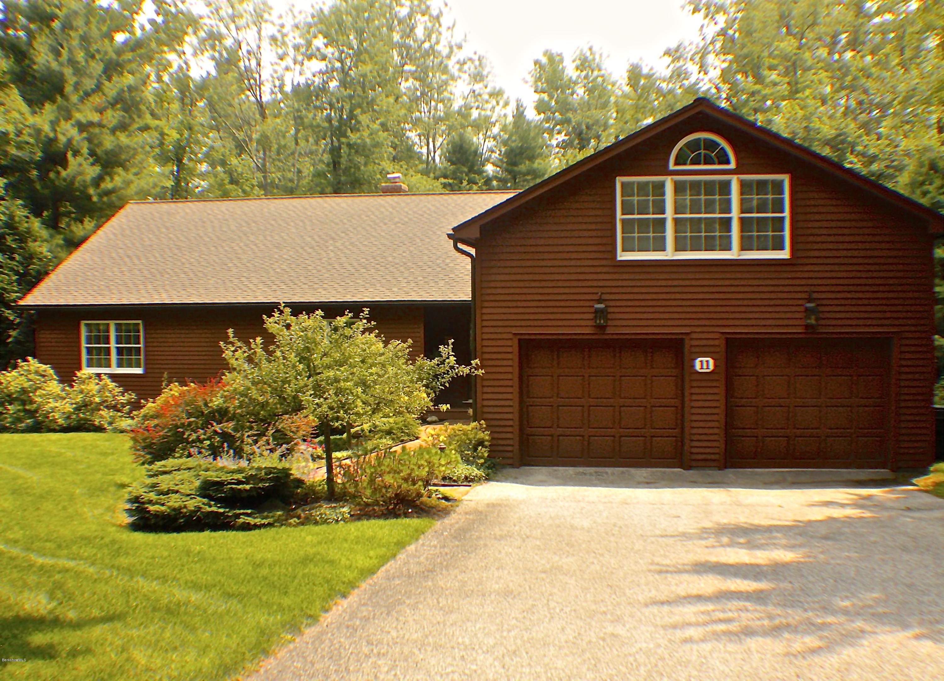 11 Quiet Knoll Road Stockbridge, MA 01266 - Photo 22 of 23 a front view of a house with a yard