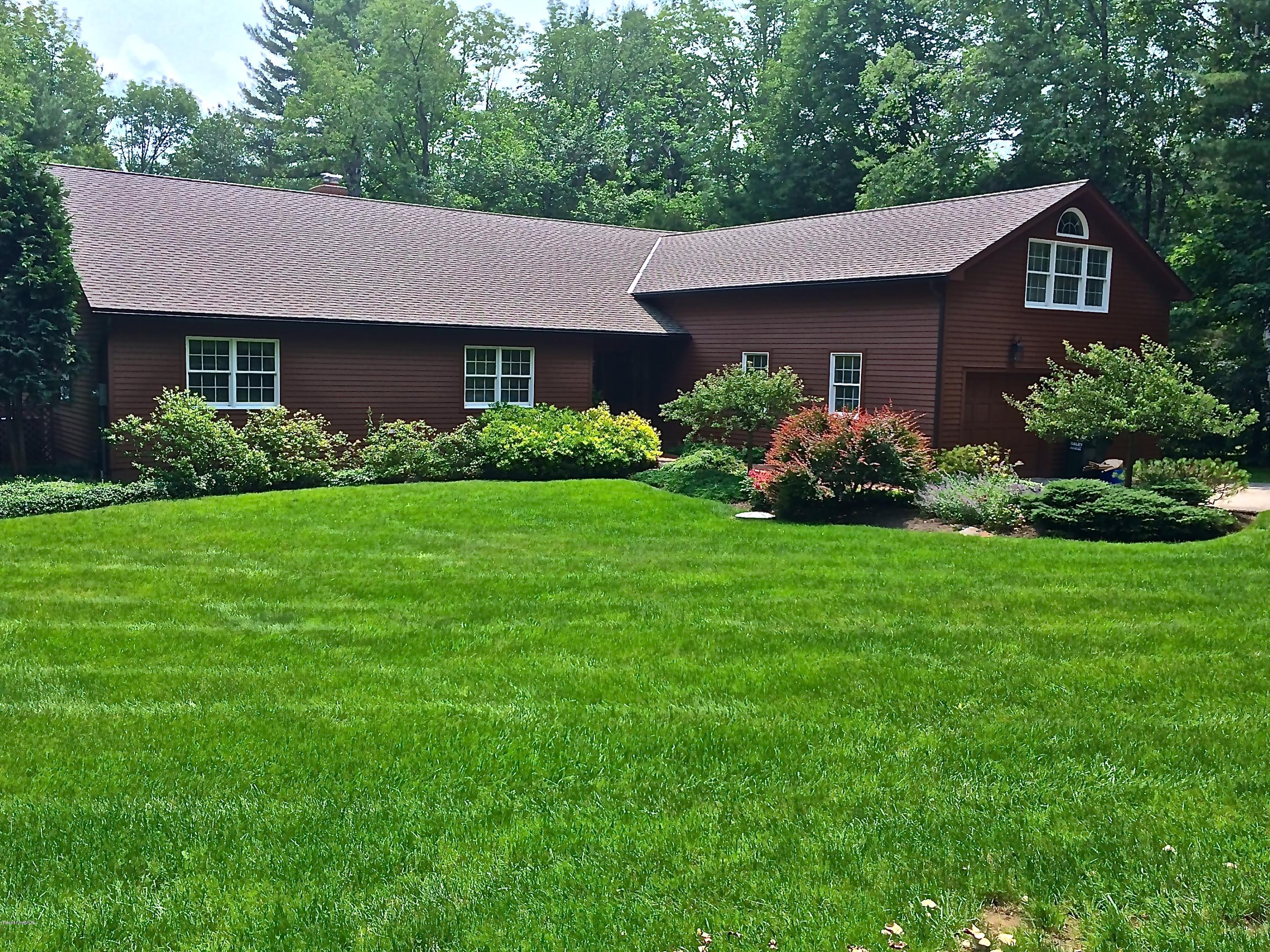11 Quiet Knoll Road Stockbridge, MA 01266 - Photo 23 of 23 a front view of a house with a garden