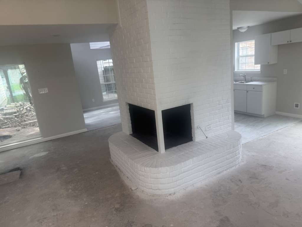14911 Walters Road Houston, TX 77068 - Photo 3 of 13 a living room with furniture and windows