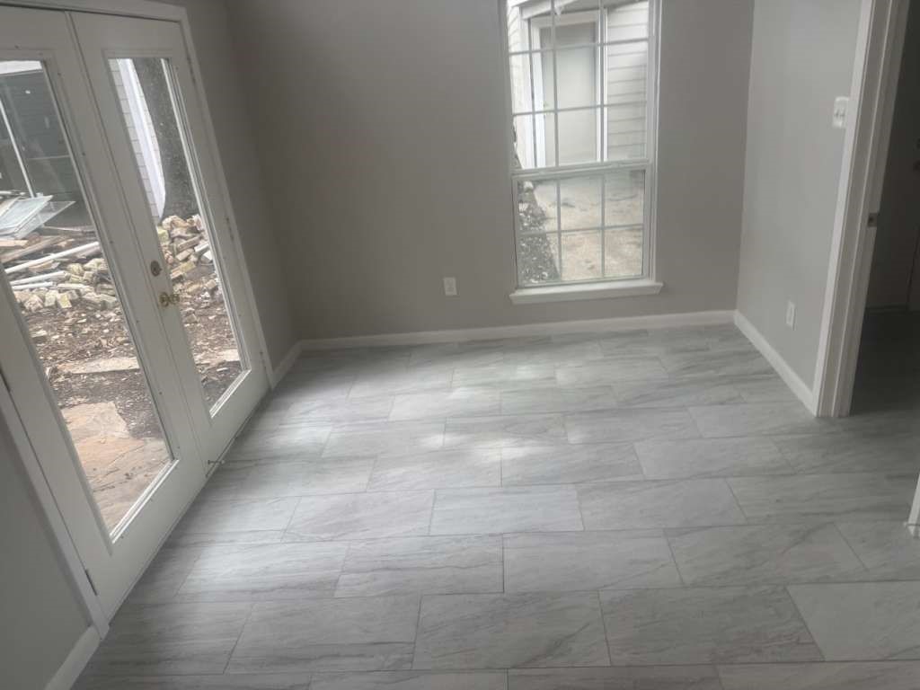 14911 Walters Road Houston, TX 77068 - Photo 7 of 13 a view of an empty room with a window