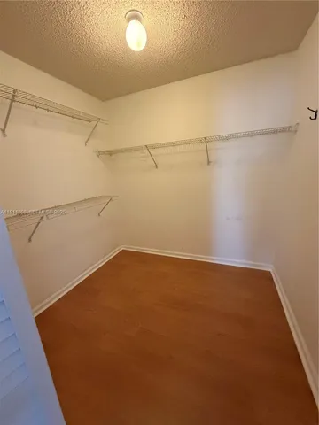 a view of a room with racks on the wall