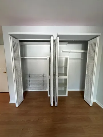 a view of backyard with hardwood