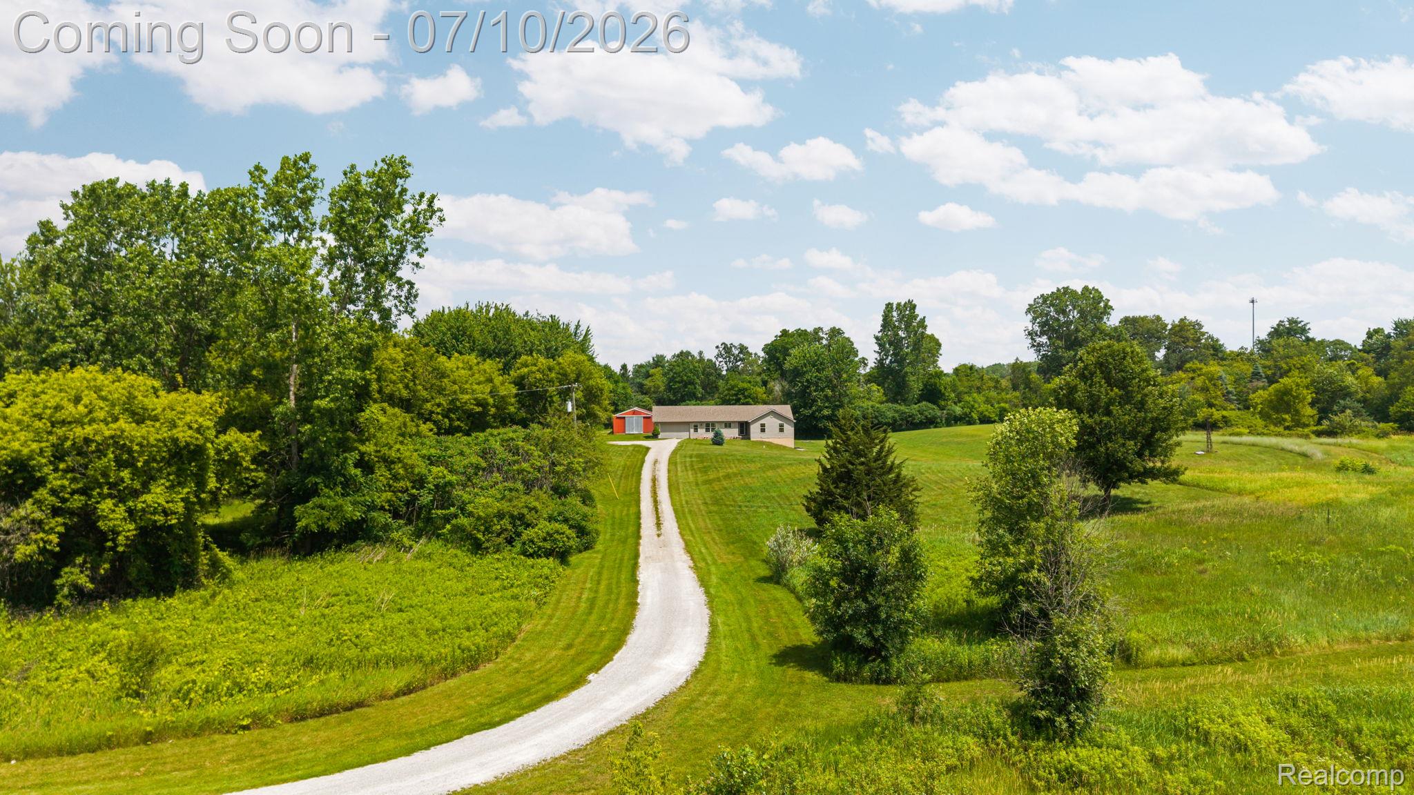 3144 North Nicholson Road Fowlerville, MI 48836 - Photo 1 of 70 1-web-or-mls-DJI_20260701123119_0250_D.jpg