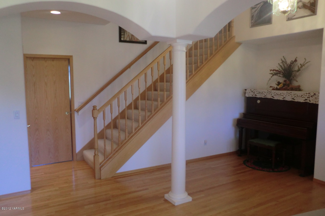 12113 West Barrett Road Yakima, WA 98908 - Photo 5 of 36 a view of entryway and hall with wooden floor