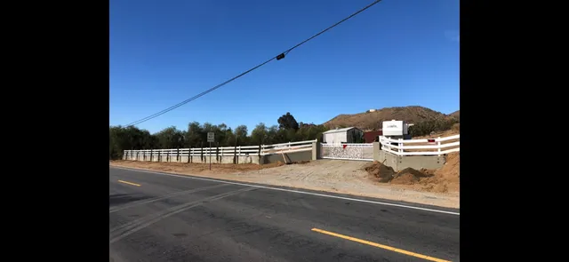 a view of swimming pool from a balcony