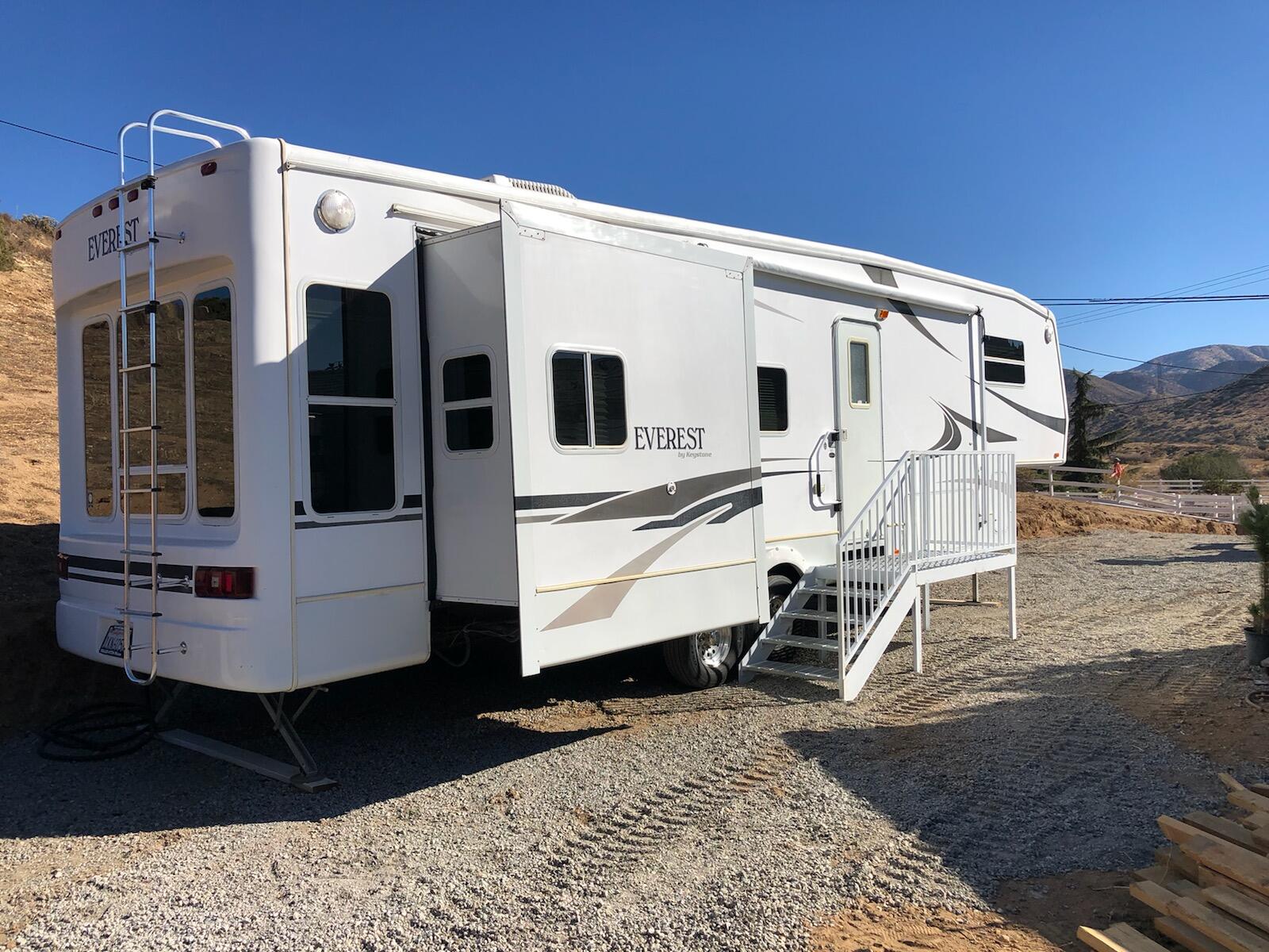 1205 Soledad Canyon Road Acton, CA 93510 - Photo 9 of 16 a white building with a glass door