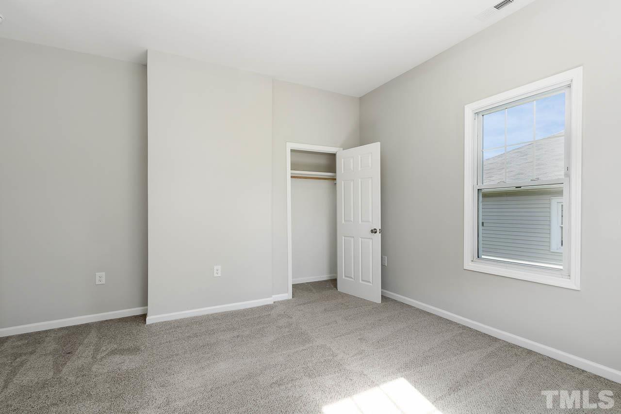 206 Edgar Street Roxboro, NC 27573 - Photo 15 of 18 a view of an empty room with a window