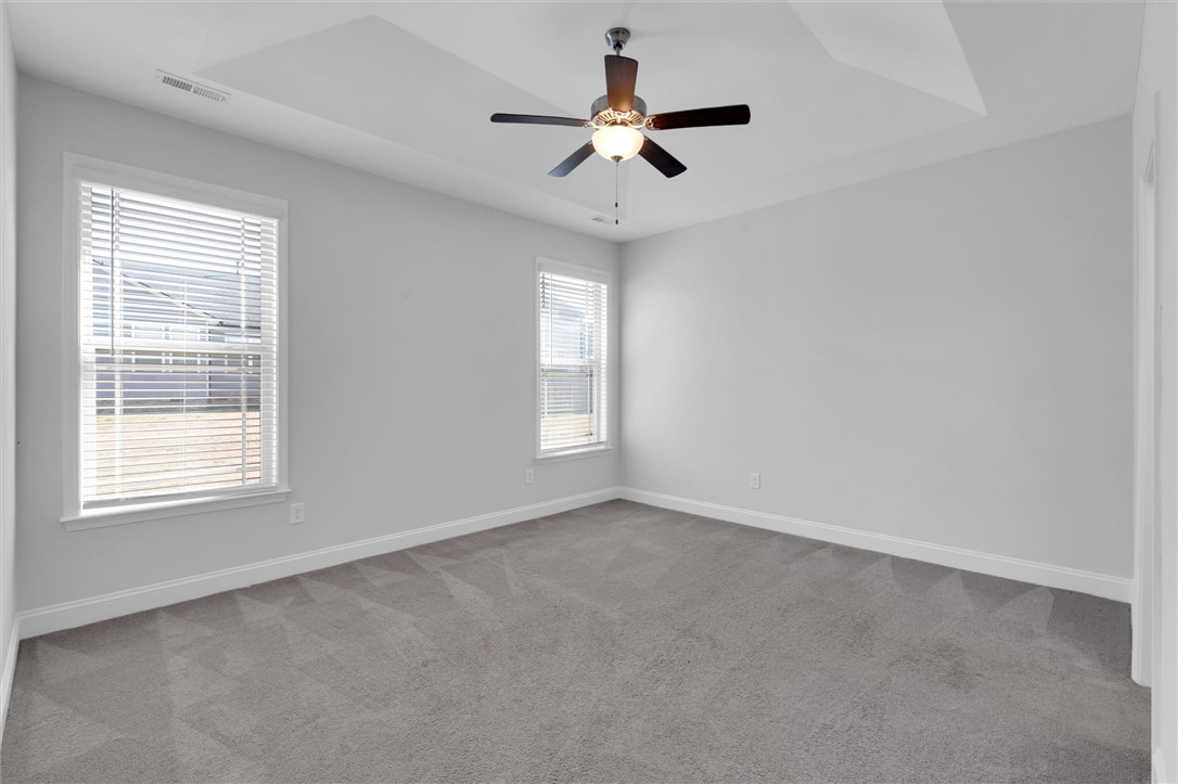 155 Norfolk Circle Anderson, SC 29625 - Photo 15 of 33 This primary bedroom features plush carpeting and abundant natural light.