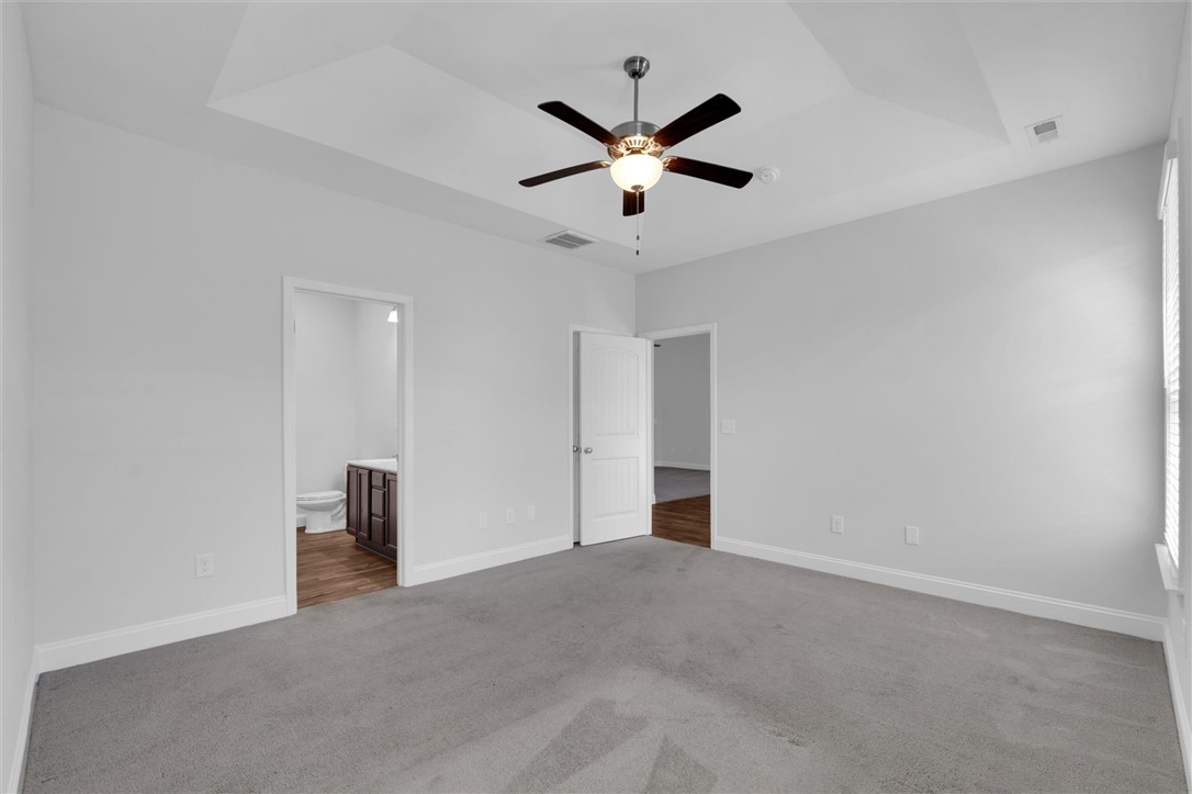155 Norfolk Circle Anderson, SC 29625 - Photo 16 of 33 This spacious bedroom offers comfort and a tranquil retreat for relaxation.