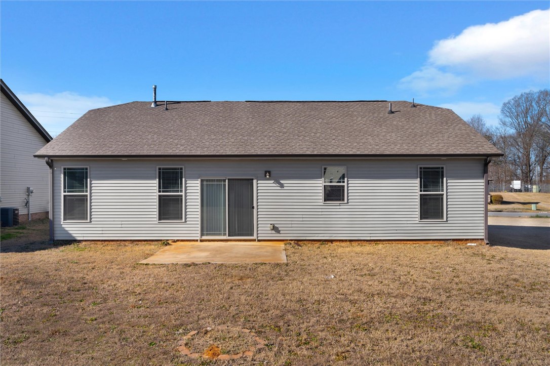 155 Norfolk Circle Anderson, SC 29625 - Photo 25 of 33 This home features a patio and durable shingle roofing, perfect for outdoor living and lasting appeal.
