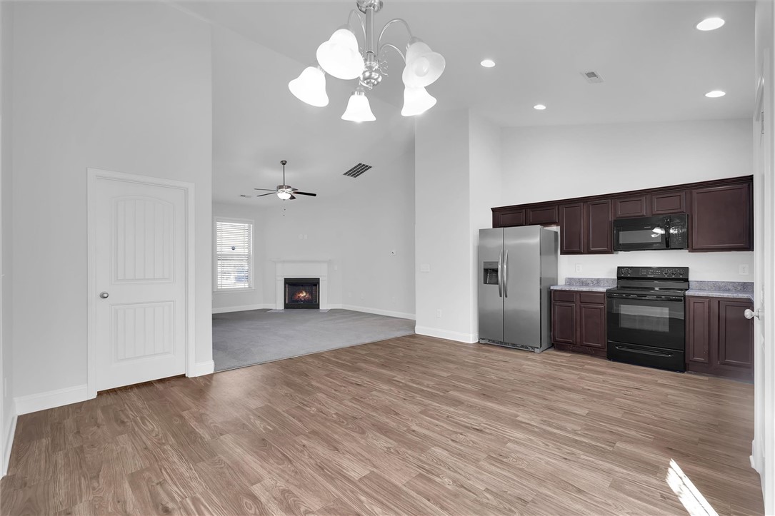 155 Norfolk Circle Anderson, SC 29625 - Photo 6 of 33 This bright, open concept living area seamlessly connects the kitchen and living room.