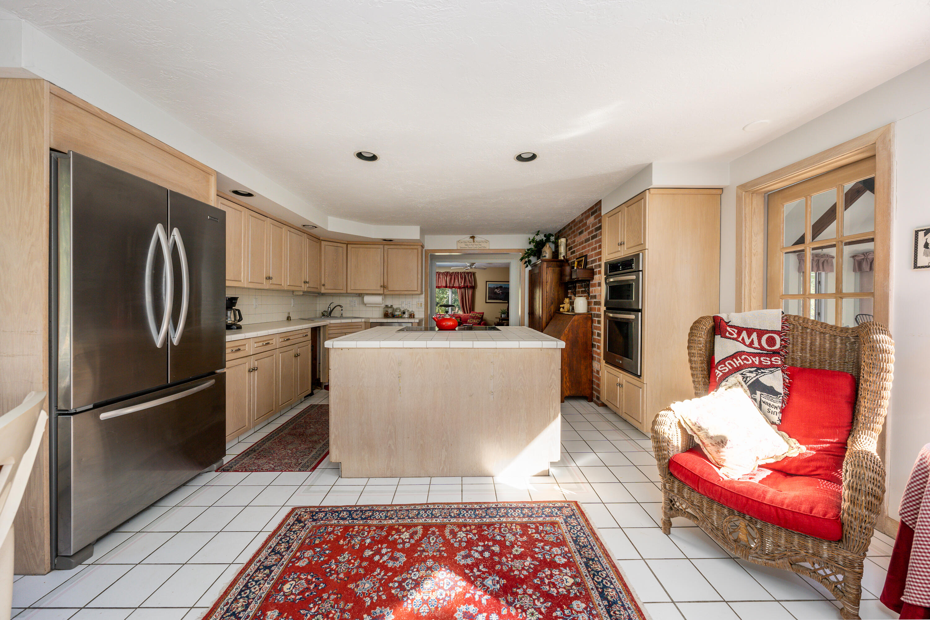 79 Waterside Drive Centerville, MA 02632 - Photo 11 of 50 a living room with stainless steel appliances furniture and a kitchen view
