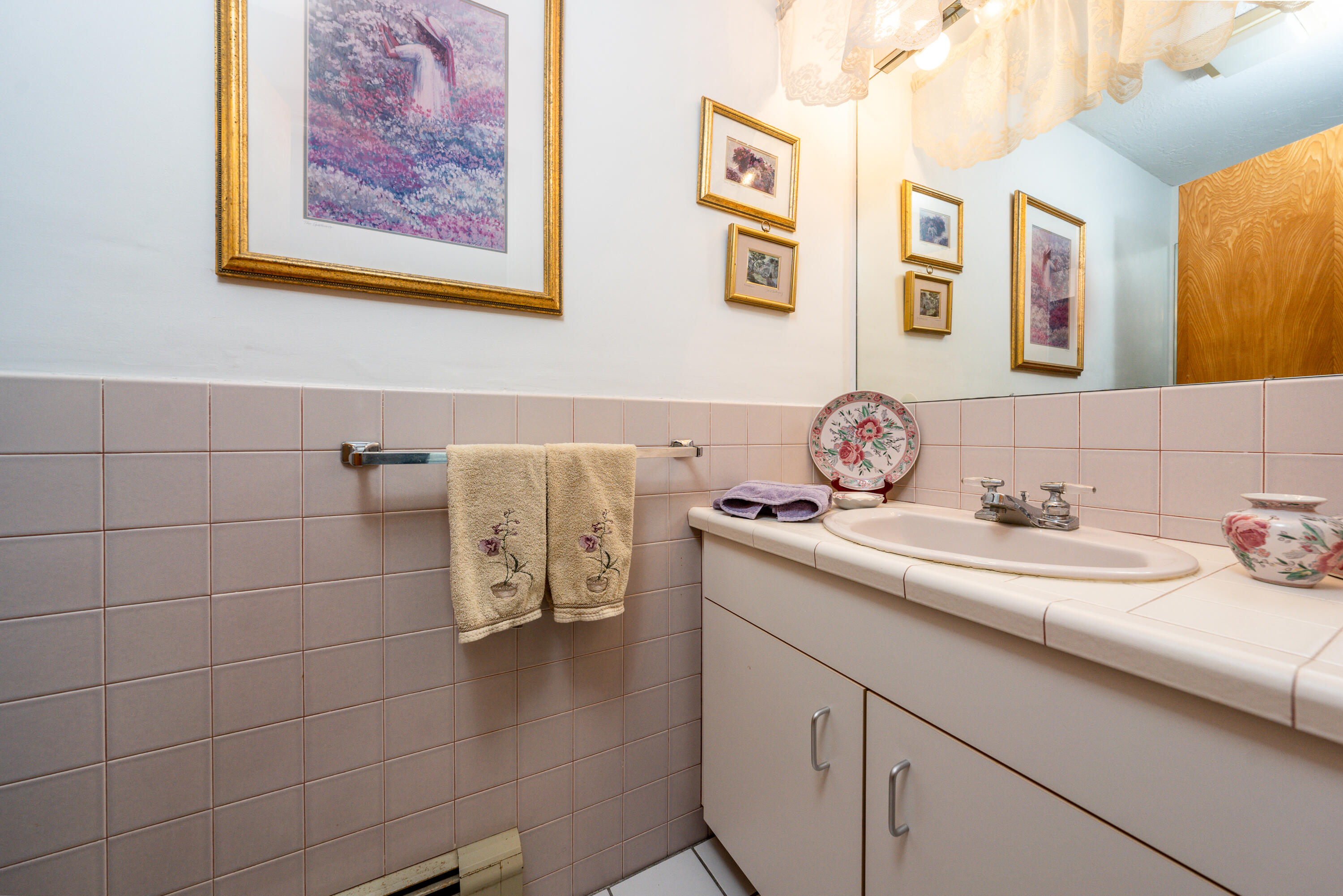 79 Waterside Drive Centerville, MA 02632 - Photo 12 of 50 a bathroom with a sink and a mirror