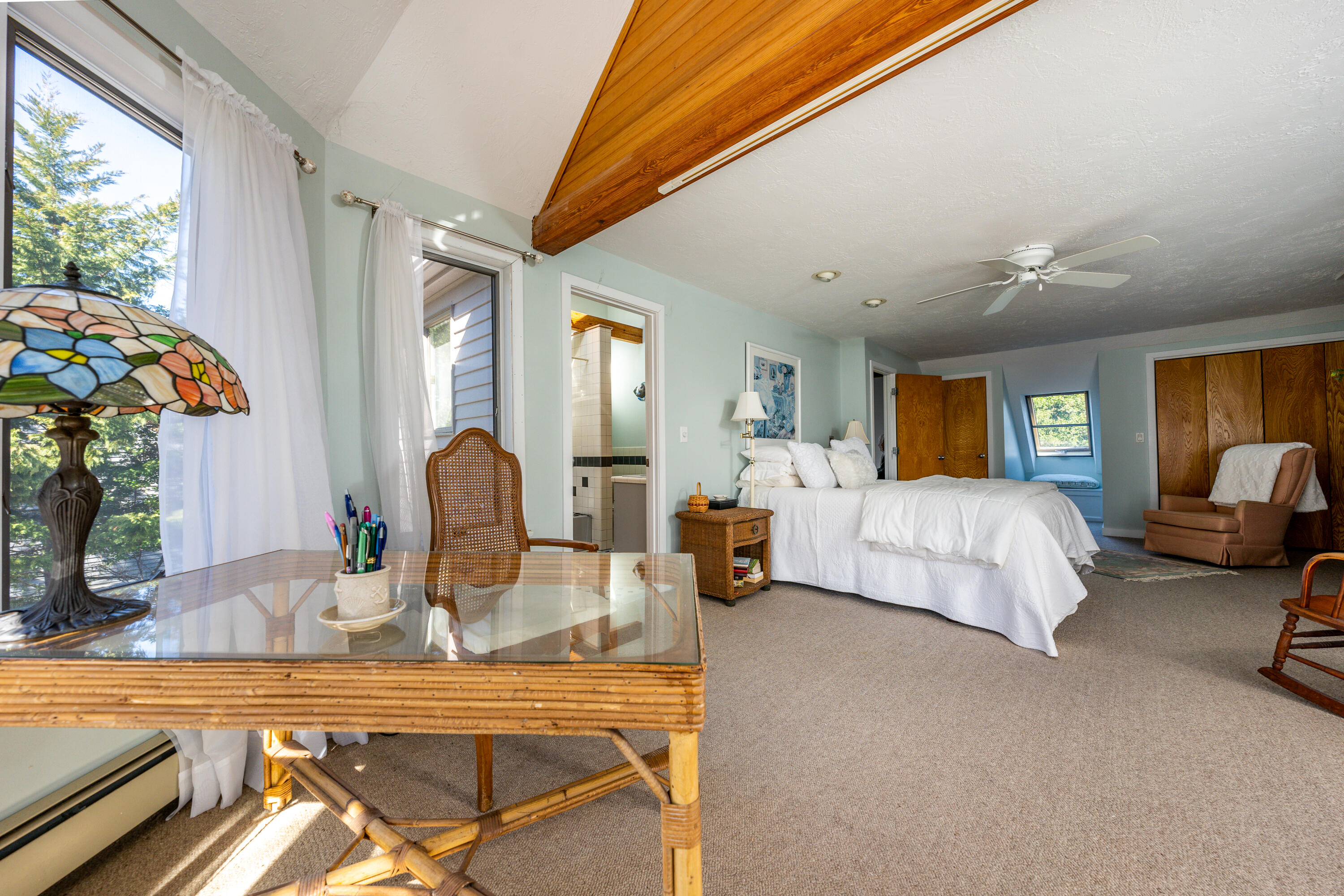 79 Waterside Drive Centerville, MA 02632 - Photo 25 of 50 a bedroom with furniture and a flat screen tv