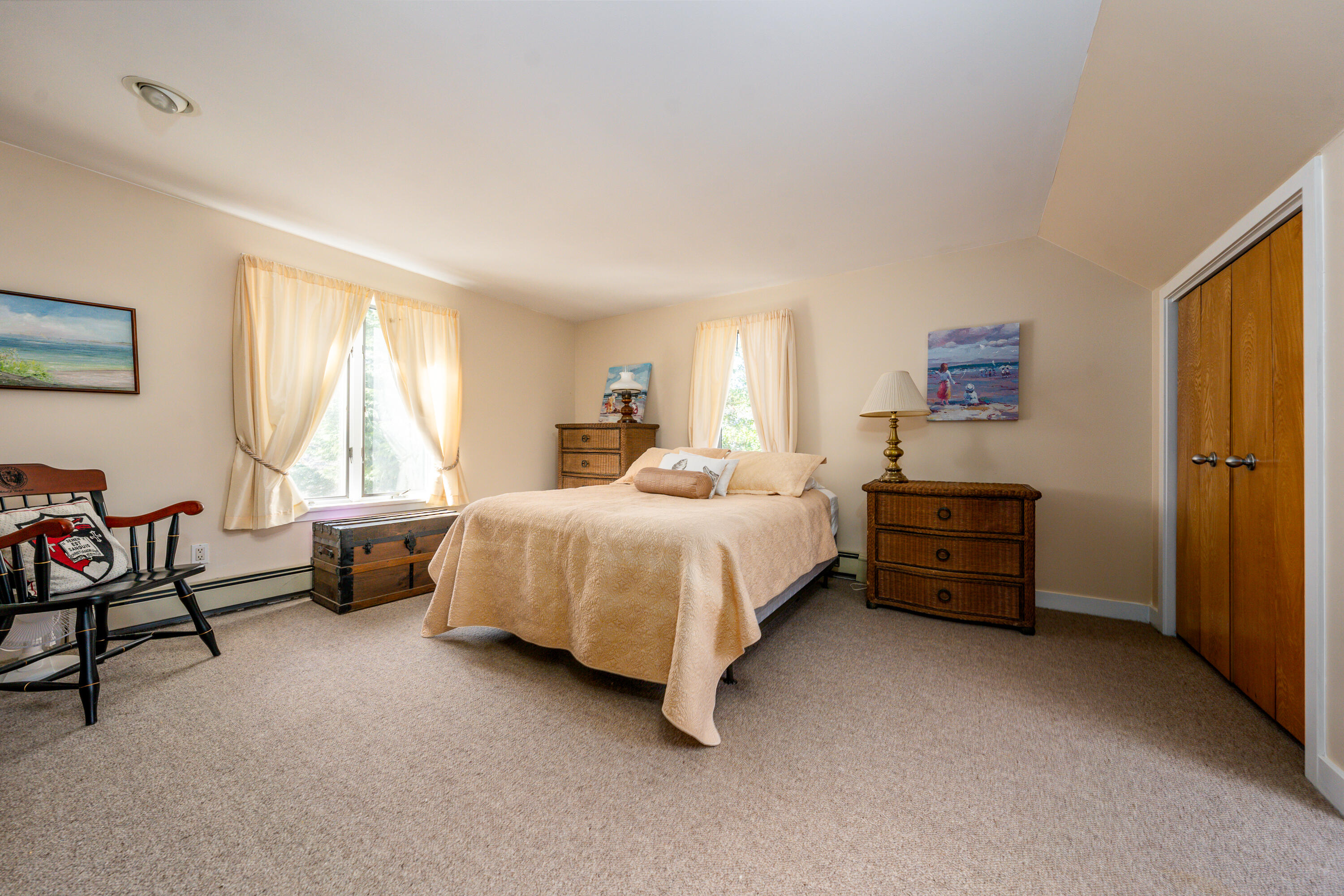 79 Waterside Drive Centerville, MA 02632 - Photo 26 of 50 a bed room with a bed and a chair